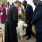 Pope Francis kneels to kiss the feet of South Sudan's President Salva Kiir