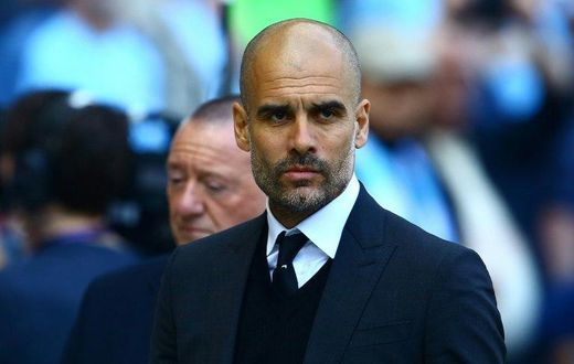 Manchester City's manager Pep Guardiola reacts ahead of the English Premier League football match against Hull City April 8, 2017