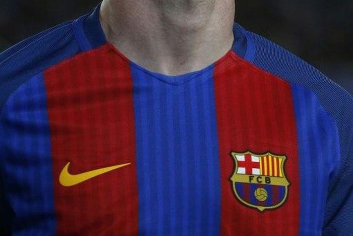 Barcelona's Lionel Messi grimaces during their UEFA Champions League quarter-final second leg football match against Juventus at the Camp Nou stadium in Barcelona on April 19, 2017
