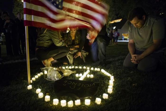 A vigil in honor of 12 people killed in a California bar shooting in November 2018 -- even the most shocking of massacres can fail to move the needle on gun control in America