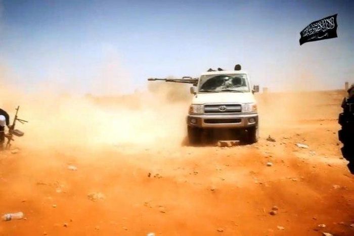 An image from Ansar al-Sharia's official media outlet allegedly shows militants of the jihadist group during a battle in the Libyan city of Benghazi