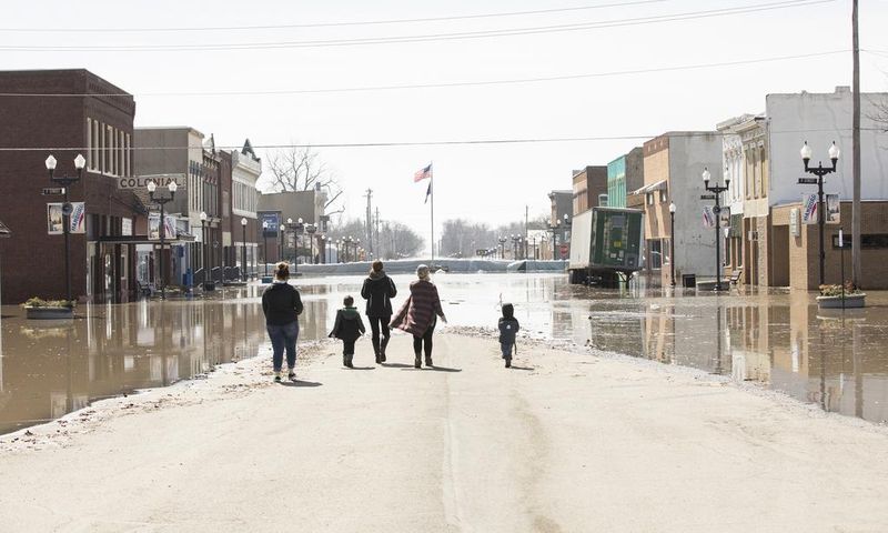 Anxious Wait Along Rivers: Which Levee Will Be Next?