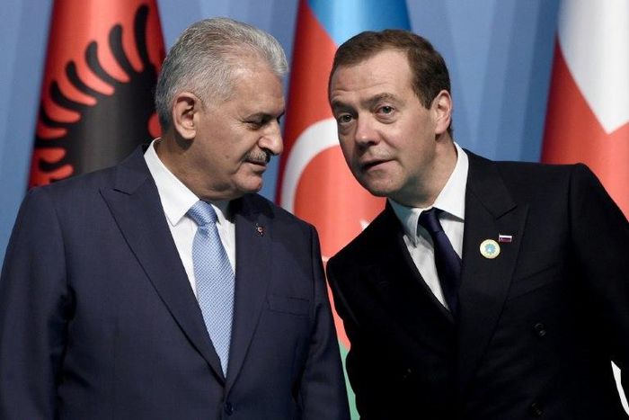 Turkish Prime Minister Binali Yildirim (left) and Russian Prime Minister Dmitry Medvedev pictured at a summit of Black Sea regional leaders in Istanbul on May 22, 2017