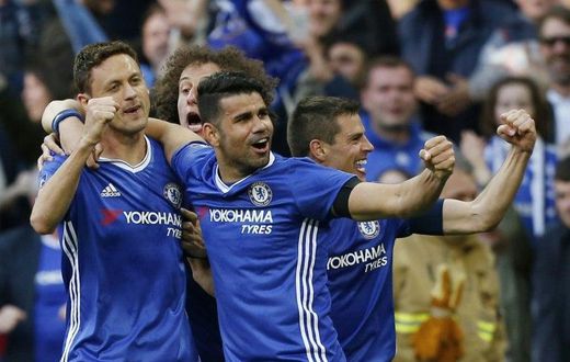 Chelsea's Nemanja Matic (L) celebrates with teammates after scoring a goal during their FA Cup semi-final match against Tottenham Hotspur, at Wembley stadium in London, on April 22, 2017