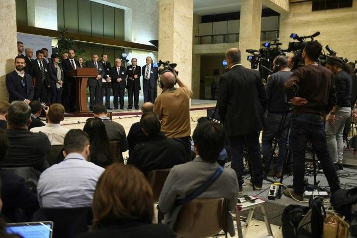 Syria's main opposition High Negotiations Committee (HNC) leader Nasr al-Hariri (C) gives a press conference next to delegates during the Intra-Syrian peace talks at the European headquarters of the United Nations in Geneva, on March 3, 2017