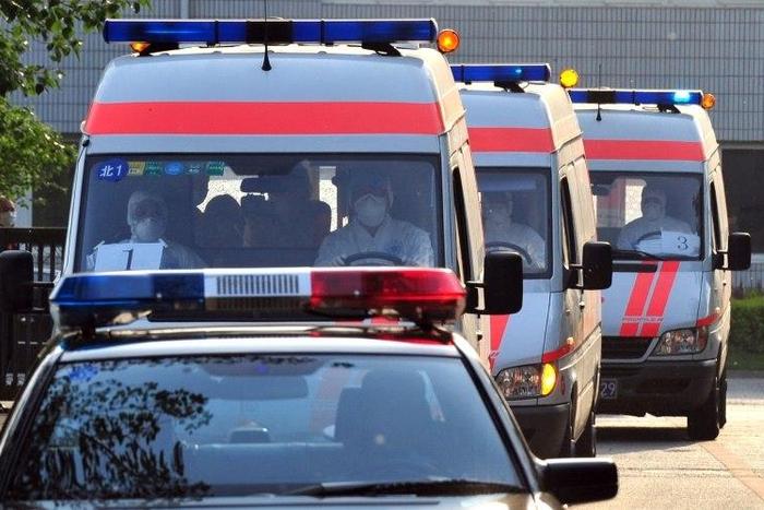 Multiple ambulances stood by as a team of more than 500 rescuers and 100 excavators attempted to save a young boy who had been trapped down a well in China for more than four days