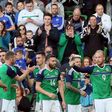 Northern Ireland's striker Liam Boyce (R) celebrates with teammates after scoring against New Zealand at the National Football Stadium at Windsor Park in Belfast on June 2, 2017