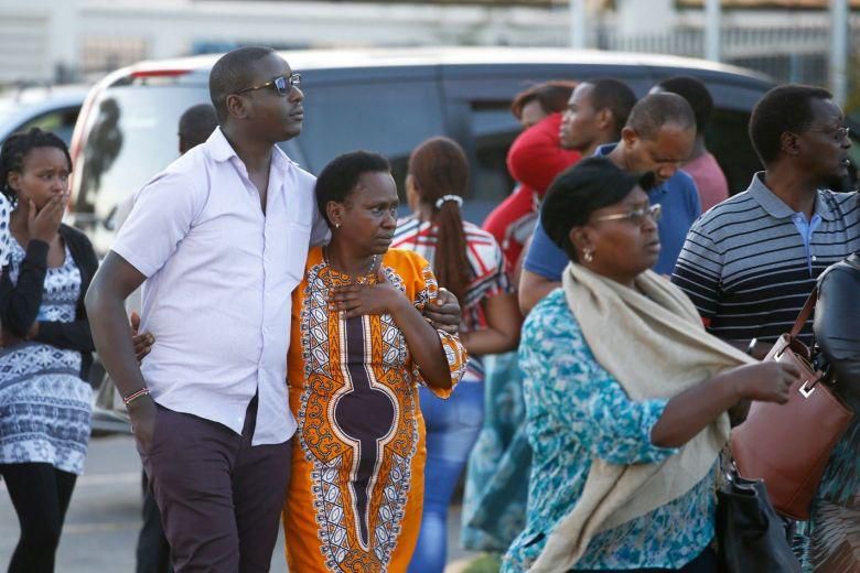 Relatives leave the information centre at JKIA