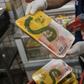 The staff of Rio de Janeiro state's consumer protection agency, PROCON, checks the temperature of frozen chicken products at a supermarket in Rio de Janeiro, Brazil, on March 24, 2017