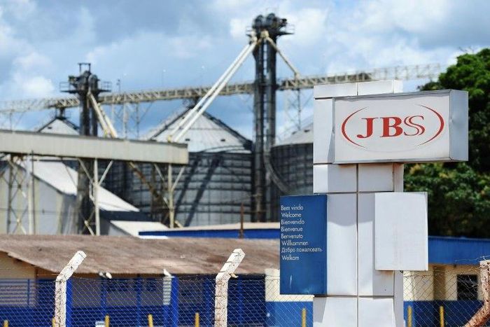 View of the JBS-Friboi Logo at the chicken processing plant entrance, in Samambaia, Federal District, Brazil on March 17, 2017