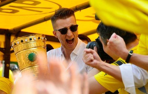 Dortmund's forward Marco Reus celebrates after Borussia Dortmund's German Cup victory over Eintracht Frankfurt