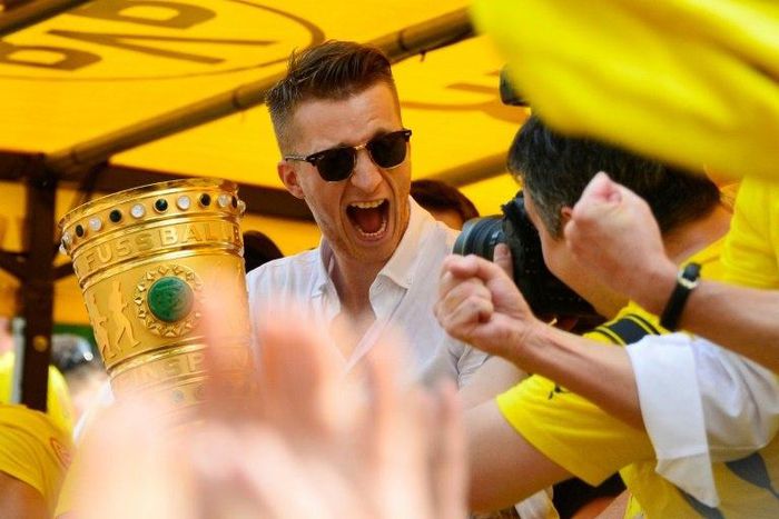 Dortmund's forward Marco Reus celebrates after Borussia Dortmund's German Cup victory over Eintracht Frankfurt