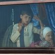 Syrian civilians being evacuated from the government-held towns of Fuaa and Kafraya, which have been under crippling siege for more than two years, on buses near the rebel-held transit point of Rashidin on April 19, 2017