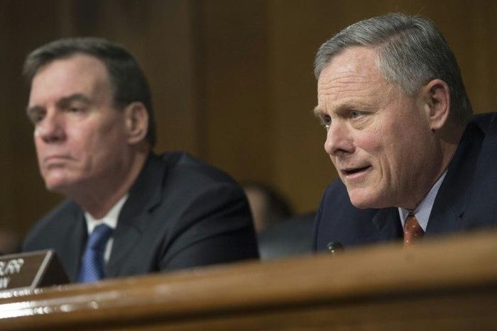 Senators Mark Warner (L) and Richard Burr -- chair of the Senate Select Committee on Intelligence -- promised a thorough investigation of Russian meddling in the presidential election at a hearing on Thursday