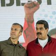 Venezuelan President Nicolas Maduro (right) and his Vice-President Tareck El Aissami participate in a Caracas rally on January 31, 2017