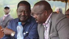 Raila Odinga (left) and Bomnet Governor Isaac Rutto.