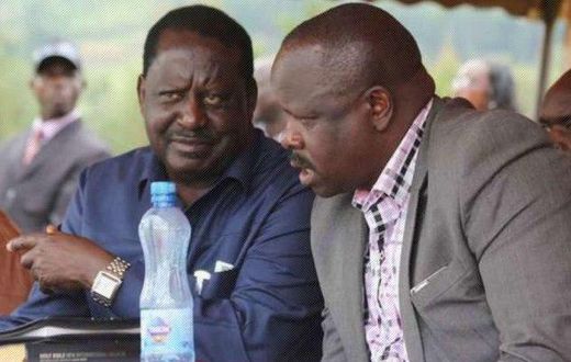 Raila Odinga (left) and Bomnet Governor Isaac Rutto.