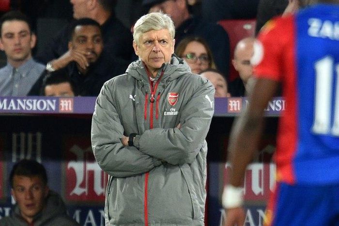 Furious Arsenal fans barracked manager Arsene Wenger and his squad as they boarded the team bus after the match at Crystal Palace