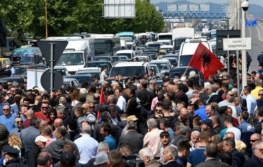 Supporters of the Albanian opposition block roads to demand the prime minister's resignation