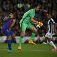Juventus goalkeeper Gianluigi Buffon claims the ball ahead of Barcelona forward Luis Suarez during the Champions League quarter-final second leg at the Camp Nou stadium in Barcelona on April 19, 2017