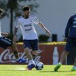 Argentina's Lionel Messi (C) passes the ball next to Ezequiel Lavezzi and Ever Banega during a team training session in Ezeiza, on March 21, 2017, ahead of their FIFA World Cup South American qualifier football matches against Chile and Venezuela