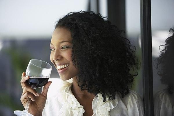 Woman drinking wine(courtesy)