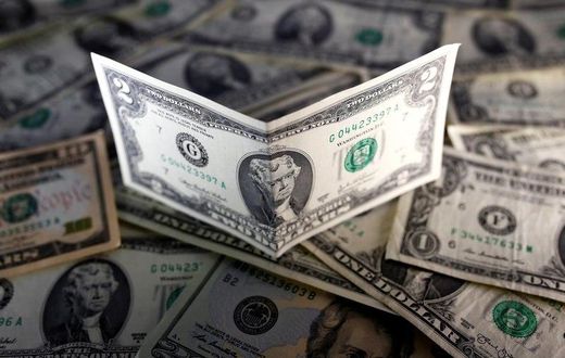 U.S. dollar notes are seen in this picture illustration