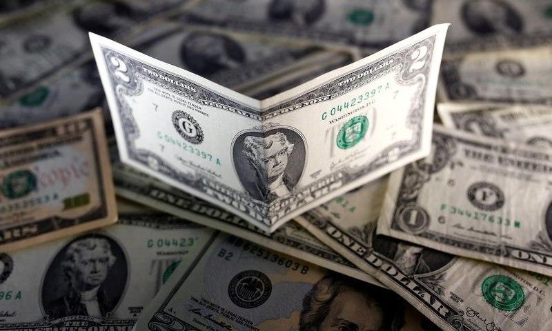 U.S. dollar notes are seen in this picture illustration