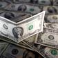 U.S. dollar notes are seen in this picture illustration