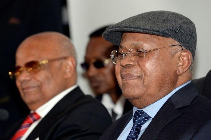 President of the Democratic Republic of Congo opposition party Union for Democracy and Social Progress Etienne Tshisekedi (R) attends a signature agreement with main opposition parties of the Democratic Republic of Congo on June 10, 2016