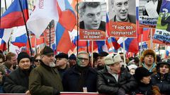 Russians march in Moscow in memory of slain opposition leader Boris Nemtsov