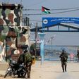 Hamas security forces stand guard on March 26, 2017, at the Erez border crossing into Israel, which was partly closed following the assassination of Hamas senior military figure Mazen Faqha