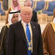 US President Donald Trump (L) walks with Saudi Arabia's King Salman bin Abdulaziz al-Saud after receiving the Order of Abdulaziz al-Saud medal from at the Saudi Royal Court in Riyadh on May 20, 2017.