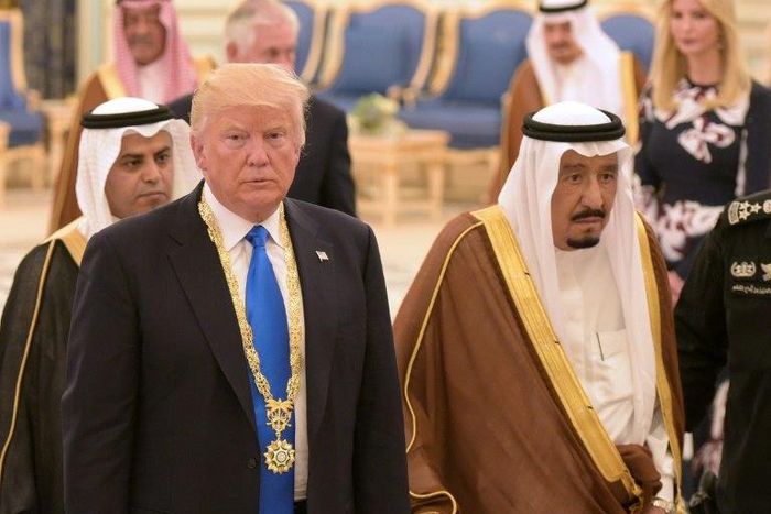 US President Donald Trump (L) walks with Saudi Arabia's King Salman bin Abdulaziz al-Saud after receiving the Order of Abdulaziz al-Saud medal from at the Saudi Royal Court in Riyadh on May 20, 2017.