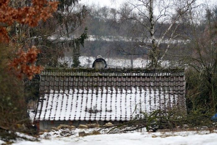 The teens were at a party in a small brick outhouse, seen here, which was apparently heated by a wood-burning stove, police said