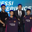 Barcelona's forward Lionel Messi poses for a photo with Chinese fans in Beijing on June 1, 2017