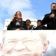 French presidential election candidate for the far-left coalition La France insoumise Jean-Luc Melenchon, speaks next to Left Party's coordinator Dannielle Simonnet aboard an "unbowed" barge on the Canal Saint-Martin on April 17, 2017 in Paris