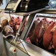 An employee sells meat during an inspection by Rio de Janeiro state's consumer protection agency, PROCON, at a supermarket in Rio de Janeiro, Brazil, on March 24, 2017