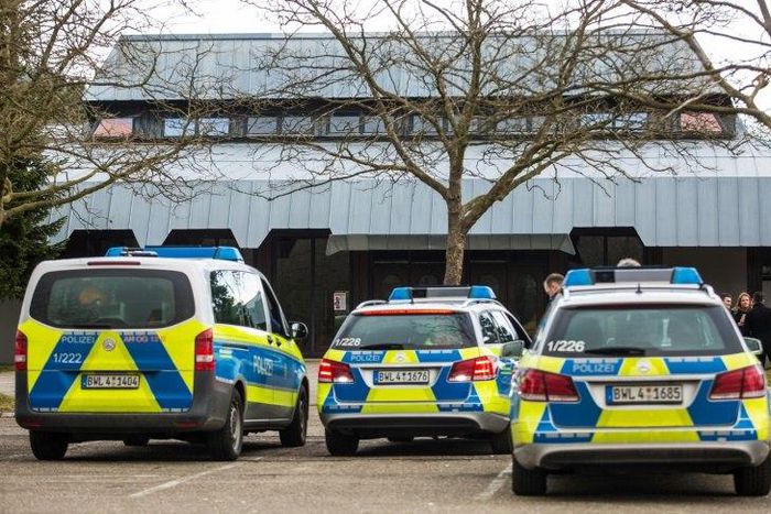 Police cars block a hall in Gaggenau, western Germany after local authorities dropped permission for a rally at which Turkey's justice minister was to speak