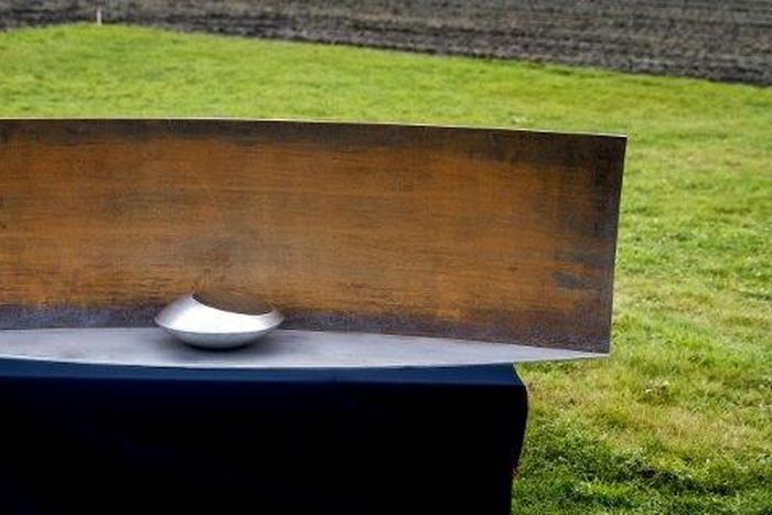 A picture taken on December 7, 2016 shows part of a national monument in memory of the victims of the downing of flight MH17 to be set up in Vijfhuizen, The Netherlands