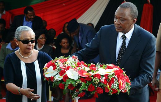 ___6488643___https:______static.pulse.com.gh___webservice___escenic___binary___6488643___2017___4___6___13___Uhuru+Kenyatta+and+first+lady+lay+flowers+in+a+past+event.