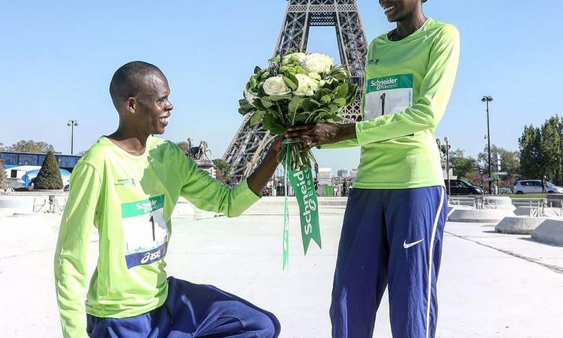 Paul Lonyangata and his wife Prurity Rionoripo after winning the Paris marathons.