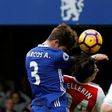 Chelsea's Marcos Alonso rises above Arsenal's Hector Bellerin to score the opening goal during their English Premier League match at Stamford Bridge in London, on February 4, 2017