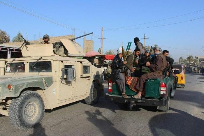 Afghan militia and military forces battle the Taliban in Kunduz in October 2016