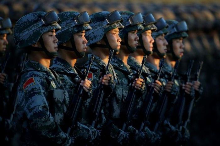 Soldiers of China's People Liberation Army (PLA) take part in a military parade at Tiananmen Square in Beijing on September 3, 2015