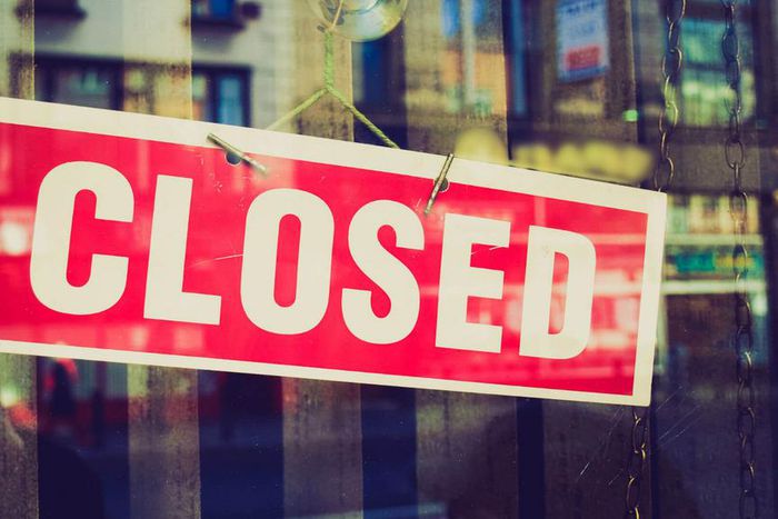 Closed sign on the door of a business