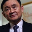 Deposed former Thai Prime Minister Thaksin Shinawatra answers a question during an interview in New York, on March 9, 2016