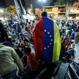 People participate in a march paying tribute to student Juan Pablo Pernalete, killed on April 26 by the impact of a gas grenade during a protest, in Caracas, on April 29, 2017