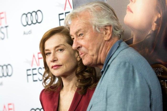 Director Paul Verhoeven (R) and actress Isabelle Huppert attend the premiere of the AFI Tribute to Huppert and the Gala Screening of "Elle" in Hollywood, California, on November 13, 2016