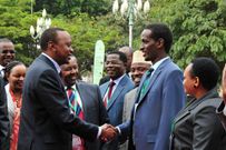 President Uhuru Kenyatta (left) greeting Fazul Mohammed during a past event